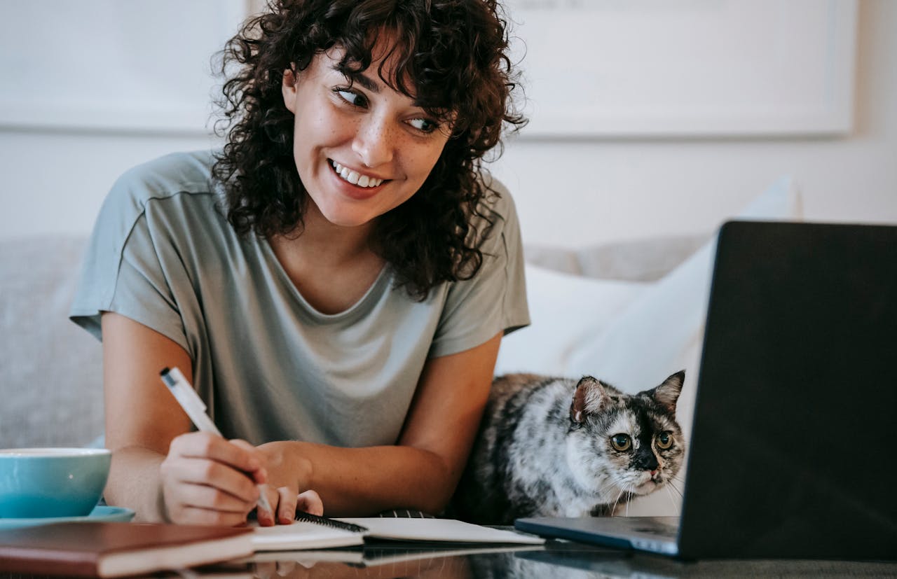 A woman who works from home with her cat